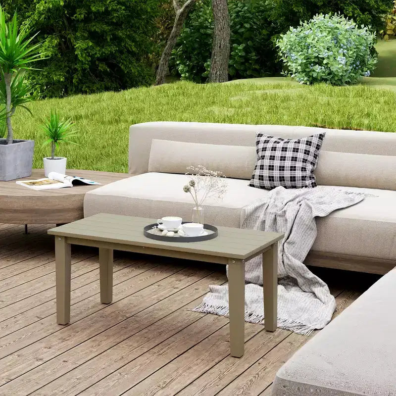 Table basse de patio tous temps avec plateau à lattes