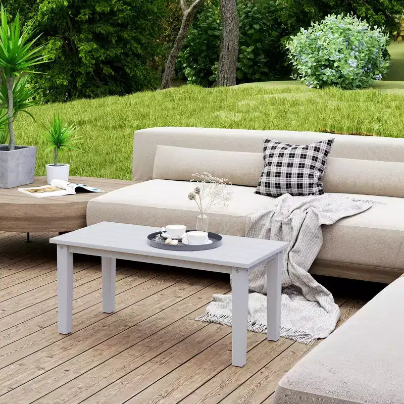 Table basse de patio tous temps avec plateau à lattes